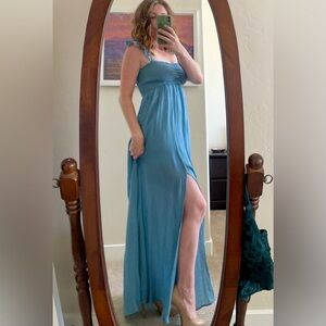 Gorgeous Blue Maxi Dress with Ruffle Straps and slit up the side.